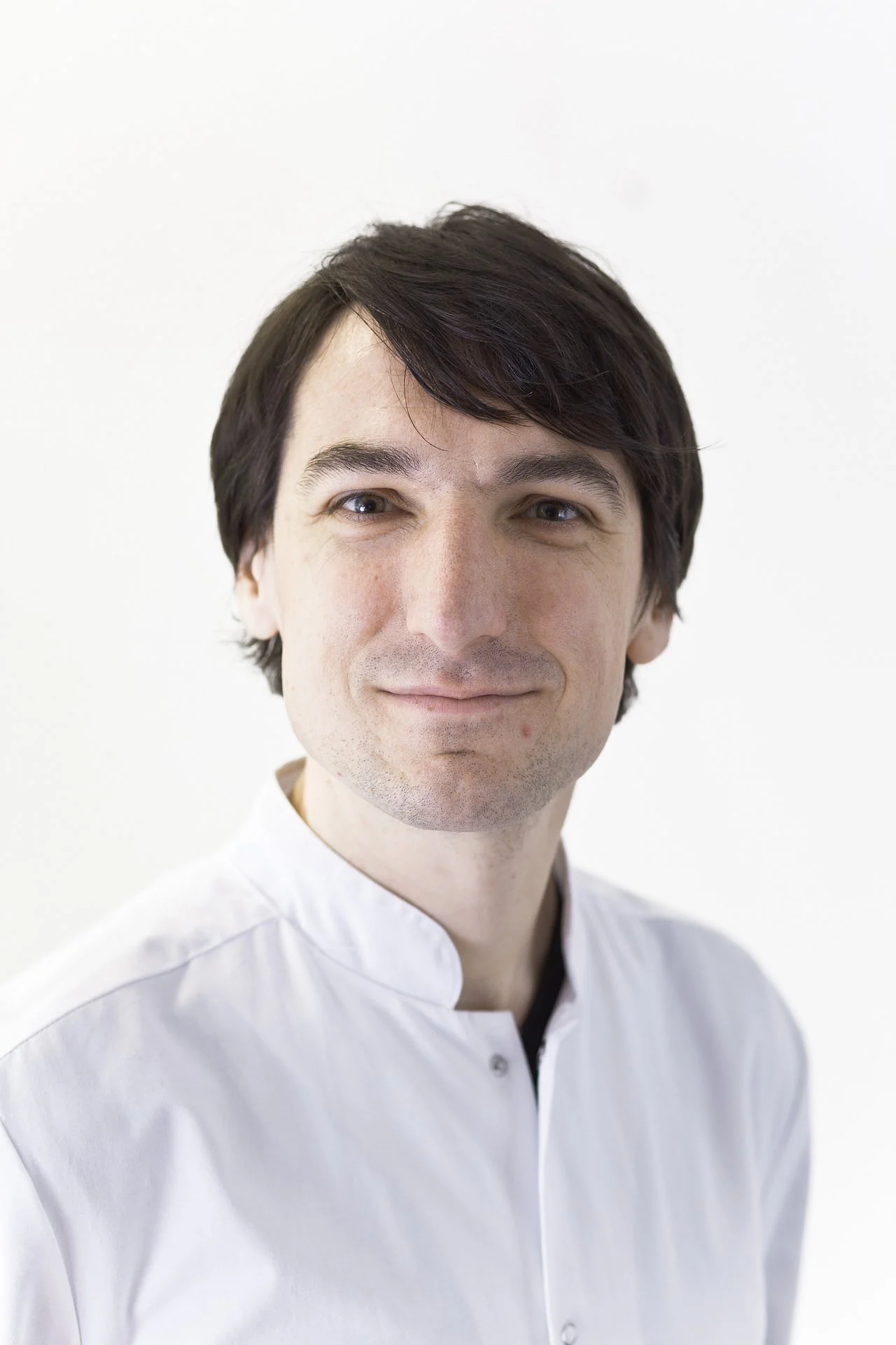Portraitfoto von Oberarzt Dominik Stehle, Facharzt für Chirurgie und Proktologie
