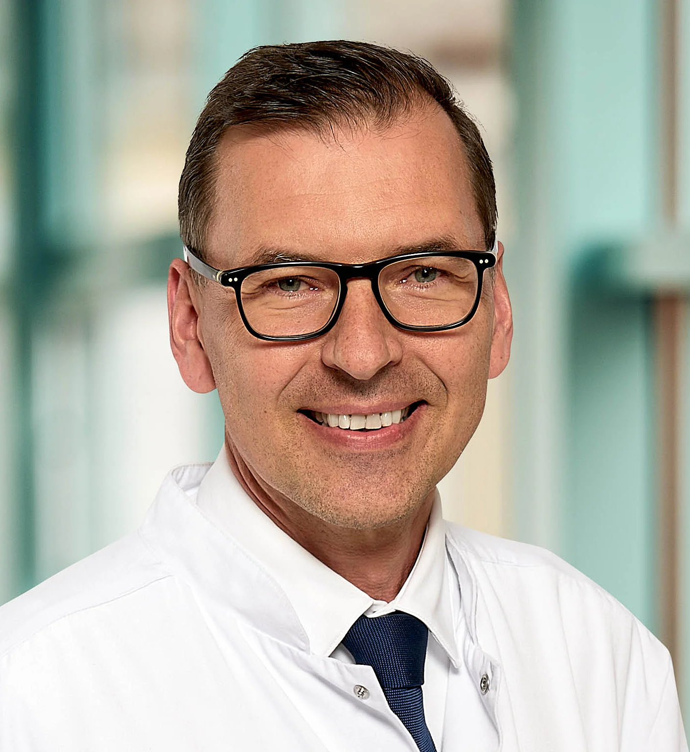 Portraitfoto von Herrn Dr. med. Christian Fink, Chefarzt Radiologie