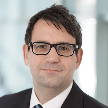 Portraitfoto von Herrn Jens Rheinhold, Bereichsleiter Finanzcontrolling