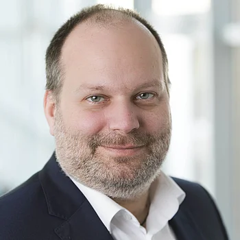 Portraitfoto von Herrn Ralf Kuchenbuch, Leiter Compliance/Datenschutz/Recht