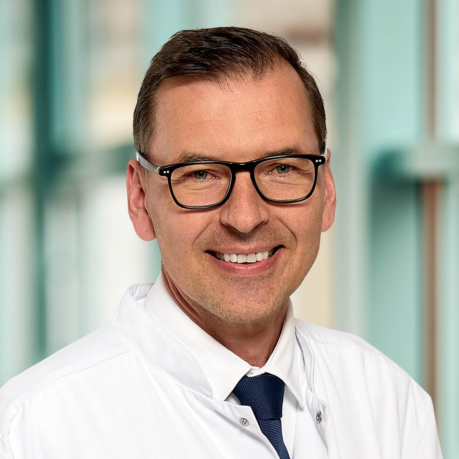Portraitfoto von Herrn Dr. med. Christian Fink, Chefarzt Radiologie